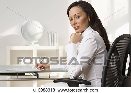 Portrait of a businesswoman View Large Photo Image Stock Photo - Portrait of a businesswoman. Fotosearch