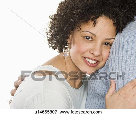 Stock Photo - Portrait of a couple embracing. Fotosearch
