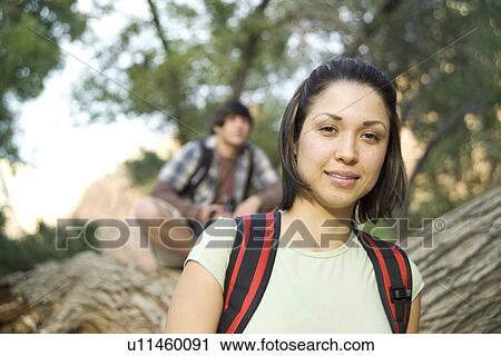 Stock Image - Portrait of a female backpacker. Fotosearch