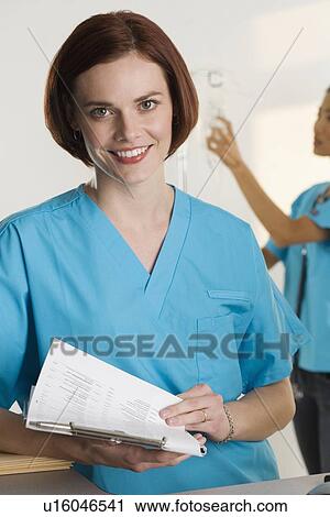 Portrait of a female medical worker View Large Photo Image Stock Image - Portrait of a female medical worker. Fotosearch
