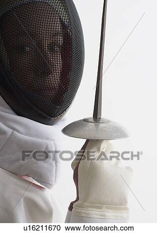 Stock Image - Portrait of a fencer. Fotosearch