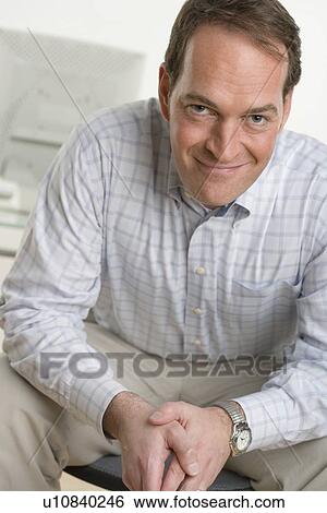 Stock Photograph - Portrait of a happy man. Fotosearch