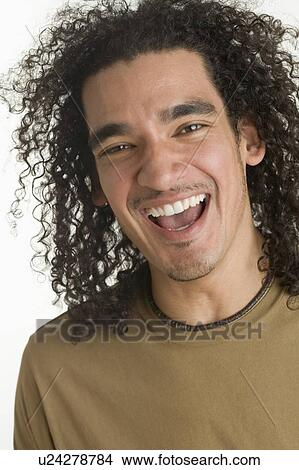 Picture - Portrait of a happy young man. Fotosearch