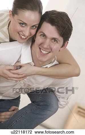 Stock Image - Portrait of a young couple. Fotosearch