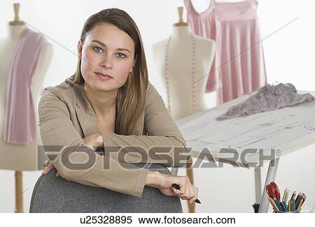 Stock Photography - Portrait of a young fashion designer. Fotosearch