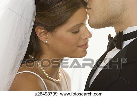 Stock Photo - Portrait of bride and groom. Fotosearch