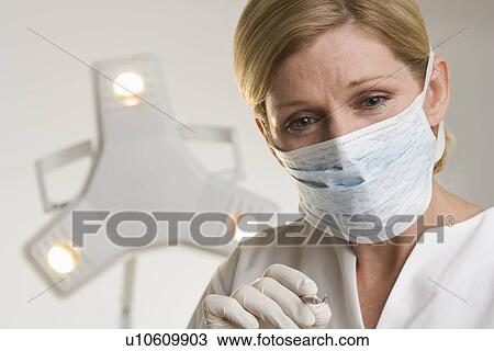Portrait of dental hygienist View Large Photo Image Stock Image - Portrait of dental hygienist. Fotosearch