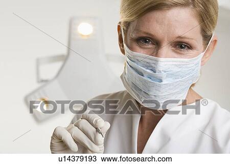 Portrait of dental hygienist View Large Photo Image Stock Image - Portrait of dental hygienist. Fotosearch