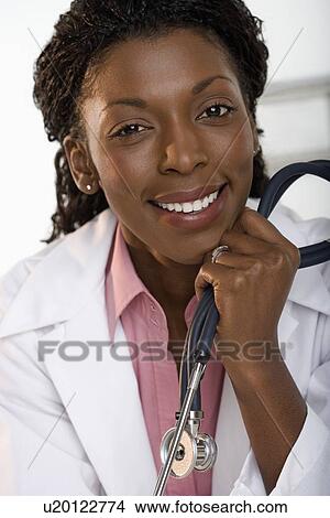 Portrait of female doctor View Large Photo Image Picture - Portrait of female doctor. Fotosearch