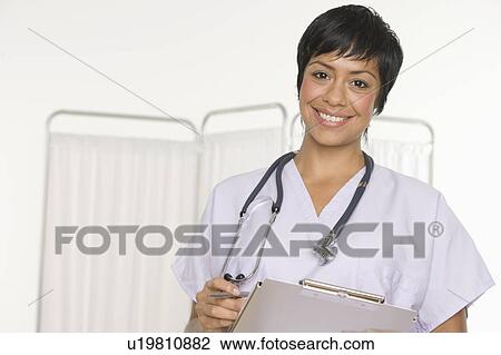 Portrait of female health practitioner View Large Photo Image Stock Image - Portrait of female health practitioner. Fotosearch