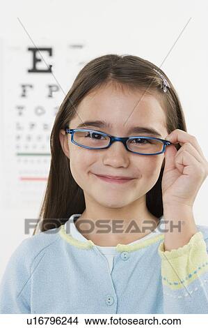 Picture - Portrait of girl wearing glasses. Fotosearch