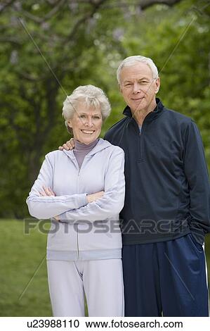 Portrait of senior couple in sweatsuits View Large Photo Image Stock Image - Portrait of senior couple in sweatsuits. Fotosearch