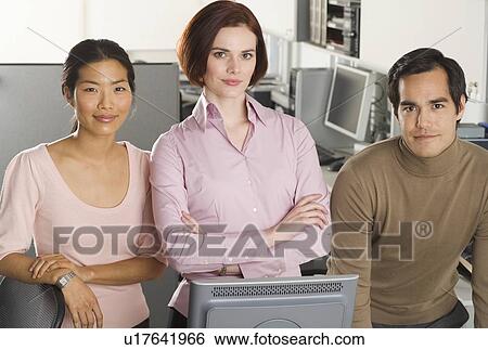 Stock Photograph - Portrait of three office workers. Fotosearch
