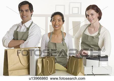 Portrait of three shopkeepers View Large Photo Image Stock Image - Portrait of three shopkeepers. Fotosearch