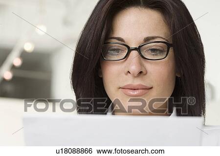 Portrait of woman in office View Large Photo Image Stock Photograph - Portrait of woman in office. Fotosearch