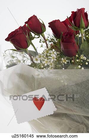 Stock Photography - Red roses with valentine card. Fotosearch