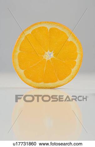Round slice of an orange View Large Photo Image Stock Image - Round slice of an orange. Fotosearch