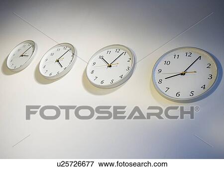 Row of clocks indicating different times View Large Photo Image Stock Photo - Row of clocks indicating different times. Fotosearch