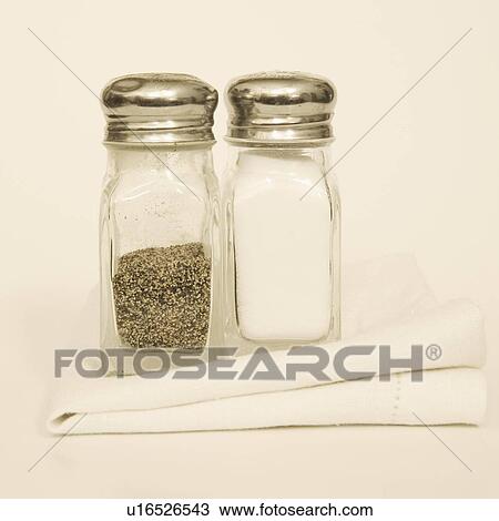 Salt and pepper shakers with napkin View Large Photo Image Stock Image - Salt and pepper shakers with napkin. Fotosearch