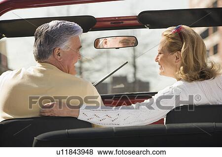 Senior couple sitting in jeep View Large Photo Image Stock Photo - Senior couple sitting in jeep. Fotosearch
