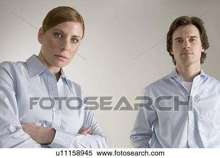 Stock Photography - Serious business couple. Fotosearch