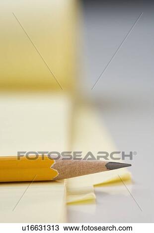 Sharpened pencil on pad of paper View Large Photo Image Stock Image - Sharpened pencil on pad of paper. Fotosearch