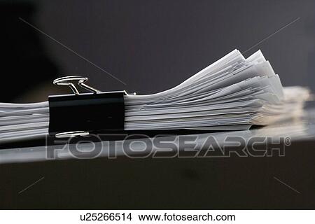Sheaf of papers clipped together View Large Photo Image Picture - Sheaf of papers clipped together. Fotosearch