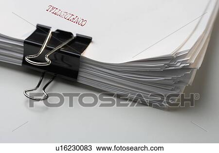 Sheaf of papers marked confidential View Large Photo Image Stock Image - Sheaf of papers marked confidential. Fotosearch