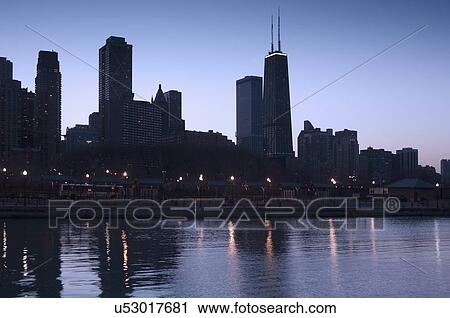 Stock Image - Skyline at sunrise with Lake Michigan Chicago Illinois USA. Fotosearch