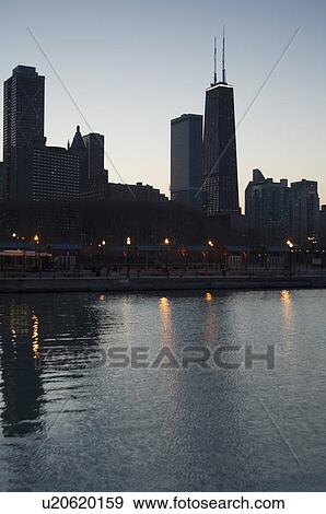 Skyline sunrise Lake Michigan Chicago Illinois USA View Large Photo Image Stock Photo - Skyline sunrise Lake Michigan Chicago Illinois USA. Fotosearch