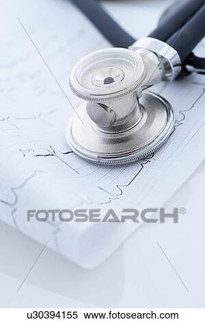 Stock Photography - Stethoscope on monitor printout. Fotosearch