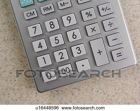 Still life of a calculator View Large Photo Image Stock Photograph - Still life of a calculator. Fotosearch