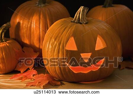 Stock Image - Still life of a jack o lantern. Fotosearch