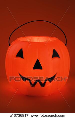 Stock Photo - Still life of a plastic pumpkin. Fotosearch