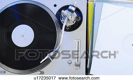 Stock Photo - Still life of a turntable and record. Fotosearch