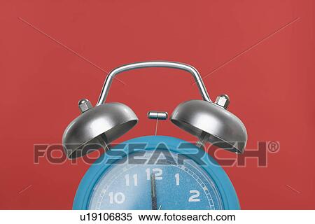 Stock Photography - Still life of an alarm clock. Fotosearch