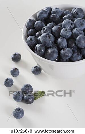 Stock Photo - Still life of bowl of blueberries. Fotosearch