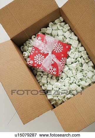 Stock Photo - Still life of box of Styrofoam with gift. Fotosearch