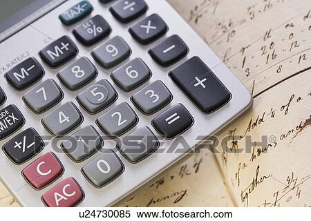 Still life of calculator and old math book View Large Photo Image Stock Photography - Still life of calculator and old math book. Fotosearch