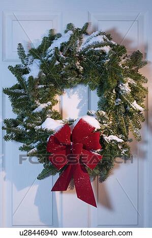Still life of Christmas wreath on door View Large Photo Image Stock Image - Still life of Christmas wreath on door. Fotosearch