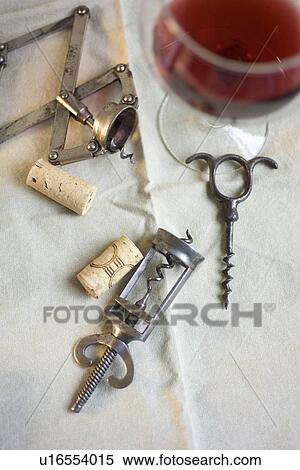 Still life of corkscrews and wine View Large Photo Image Stock Photography - Still life of corkscrews and wine. Fotosearch