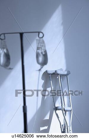 Still life of crutches and IV View Large Photo Image Stock Photograph - Still life of crutches and IV. Fotosearch
