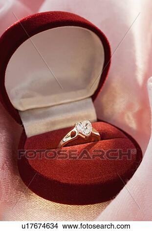 Picture - Still life of diamond engagement ring. Fotosearch