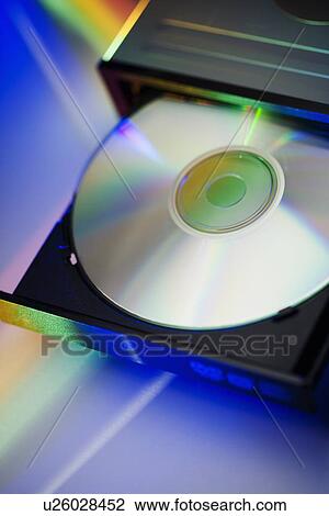 Still life of disc in computer drive View Large Photo Image Stock Image - Still life of disc in computer drive. Fotosearch