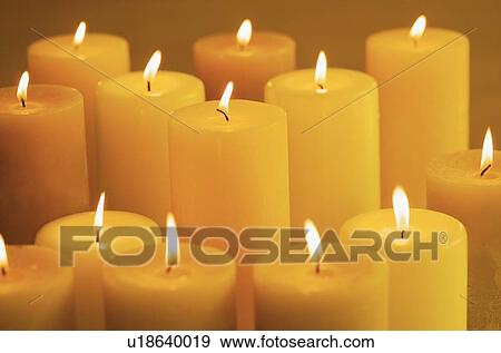 Still life of lighted candles View Large Photo Image Stock Photo - Still life of lighted candles. Fotosearch