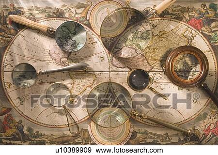Still life of old map with magnifying glasses View Large Photo Image Stock Photo - Still life of old map with magnifying glasses. Fotosearch