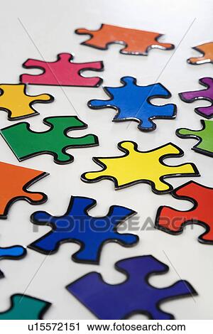 Stock Image - Still life of puzzle pieces. Fotosearch