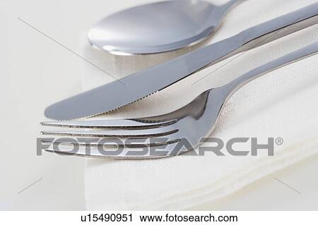 Still life of silverware and napkin View Large Photo Image Stock Image - Still life of silverware and napkin. Fotosearch