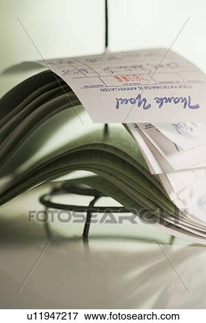 Still life of spindle for receipts View Large Photo Image Stock Photo - Still life of spindle for receipts. Fotosearch
