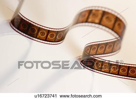 Strip of movie film from above View Large Photo Image Stock Image - Strip of movie film from above. Fotosearch